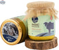 Indic Organics Malnad Gidda A2 Desi Cow Ghee from Prithvi Mart, pure and premium cultured ghee with cows grazing in a forest setting.