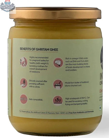 Pure Indic Organics Malnad Gidda A2 Desi Cow Ghee from Prithvi Mart, shown in a natural rural setting with green pastures.