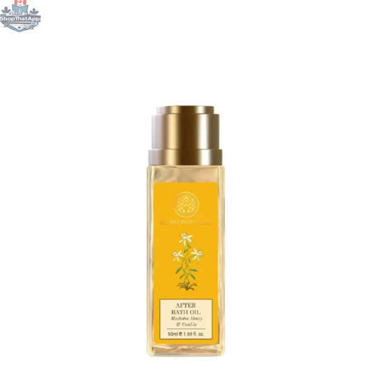 Forest Essentials after bath oil with mashobra honey and vanilla in a glass bottle, showing the oil and natural ingredients.