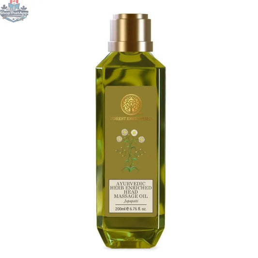 Ayurvedic Herb Enriched Head Massage Oil by Forest Essentials, featuring natural herbs in a glass bottle for personal care.