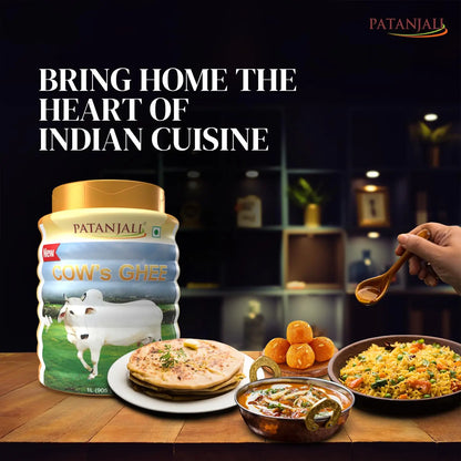 Patanjali Cow Ghee in a 1L pack, showing a clear glass jar filled with golden pure cow ghee, labeled with the Patanjali brand.