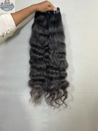 Indian curly human hair extensions from Prithvi Mart, showing three bundles of premium curly hair with natural texture.