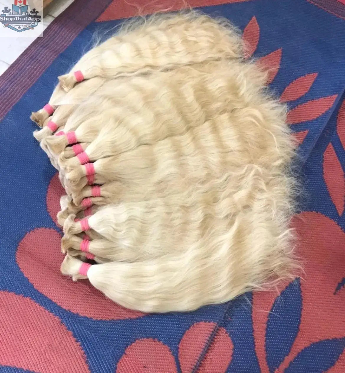 Indian Raw Blonde 613 hair extensions by Prithvi Mart, showcasing silky, straight blonde hair for versatile styling options.