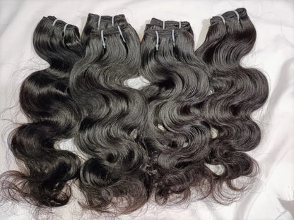 Indian Virgin Body Wave Hair extensions bundles by Prithvi Mart, showcasing smooth, wavy hair for wholesale and retail use.