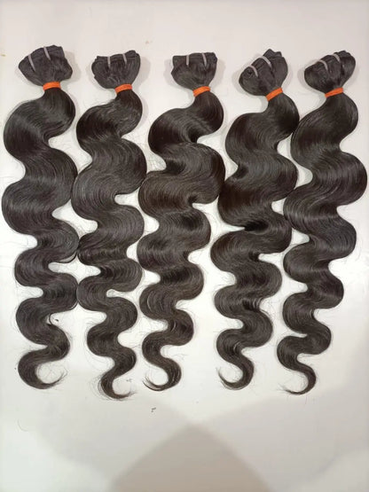 Indian Virgin Body Wave Hair Bundles from Prithvi Mart, showcasing smooth, wavy hair extensions for wholesale and retail use.