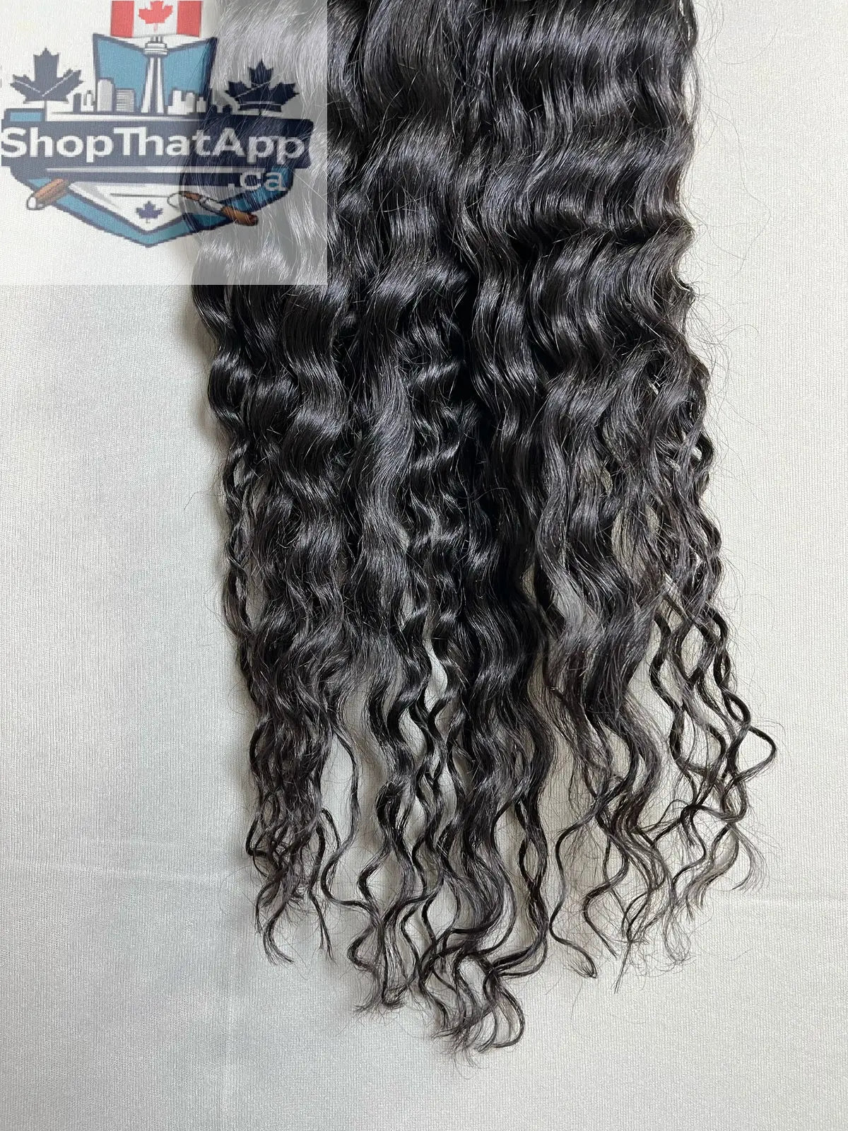 Indian Virgin Curly Hair bundles from Prithvi Mart, showcasing lush, natural curly hair extensions with full volume and texture.