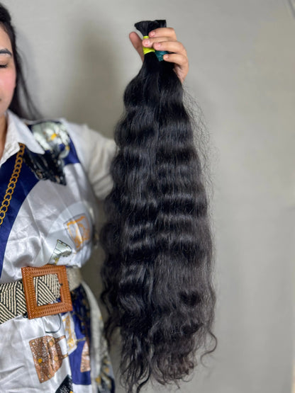 Raw Indian wavy hair bundles from Prithvi Mart, premium quality bulk hair for a natural, flowing hairstyle.