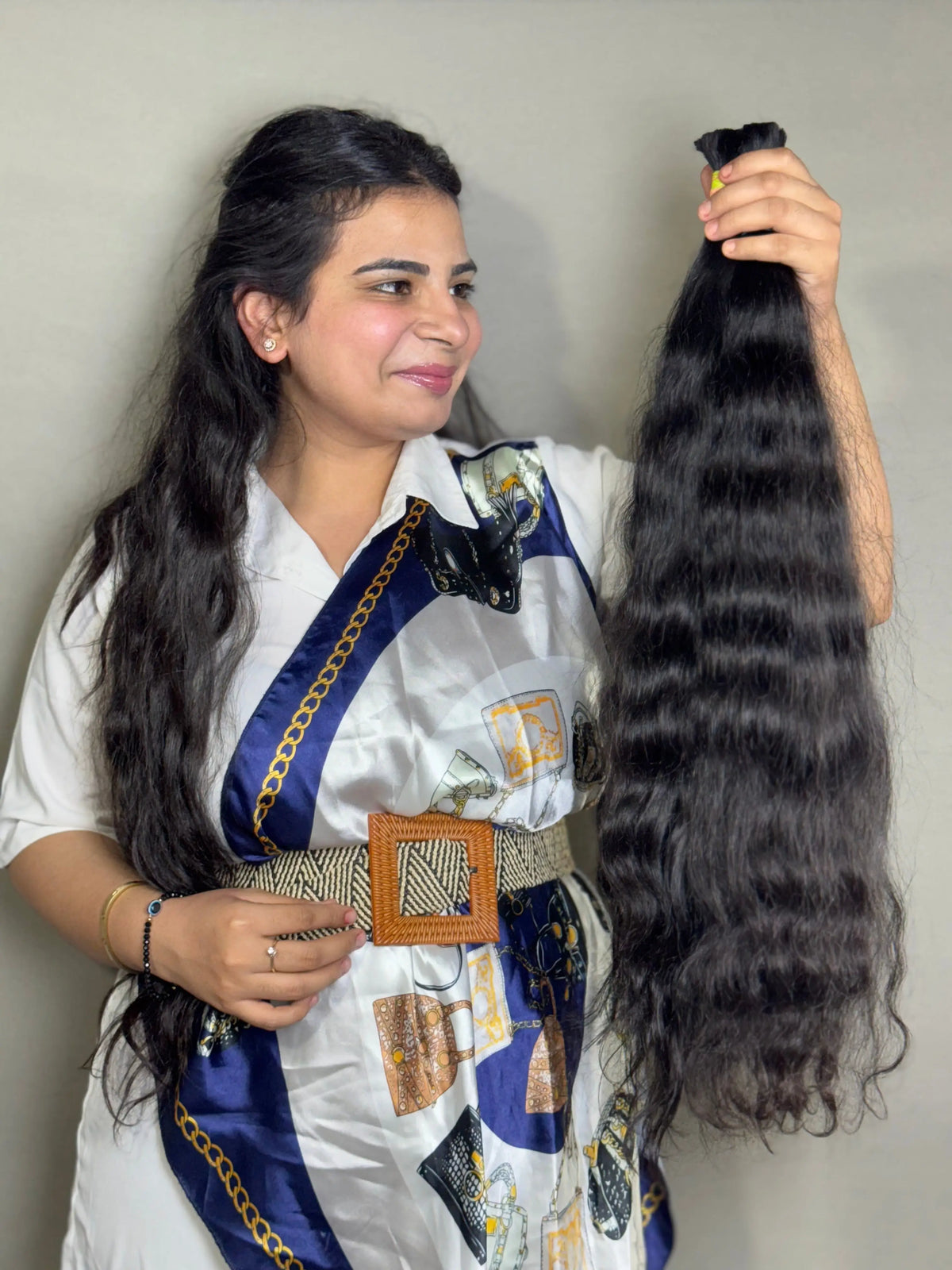 Raw Indian wavy hair bundles from Prithvi Mart, premium quality hair extensions for a natural, flowing hairstyle.