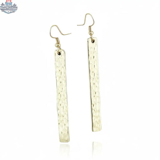 Gold metal bar earrings by Suzie Blue Canada, stylish and minimalist jewelry for every occasion, featuring sleek gold-toned design.
