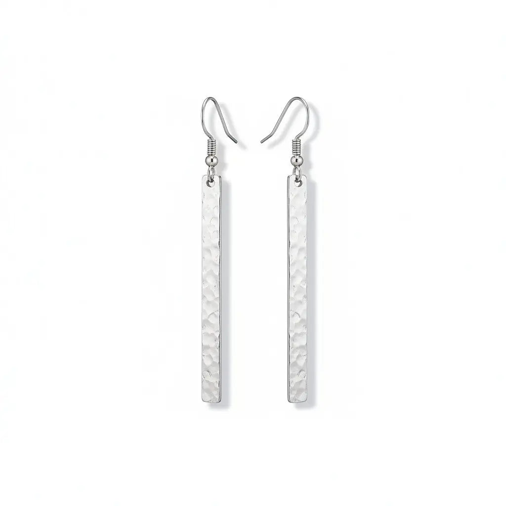 Silver metal bar earrings by Suzie Blue Canada featuring an elegant minimalist design, displayed on a plain background.