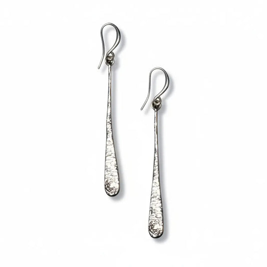 Silver plated Beaten Long Teardrop Earrings by Suzie Blue Canada featuring elegant, handcrafted jewelry design.