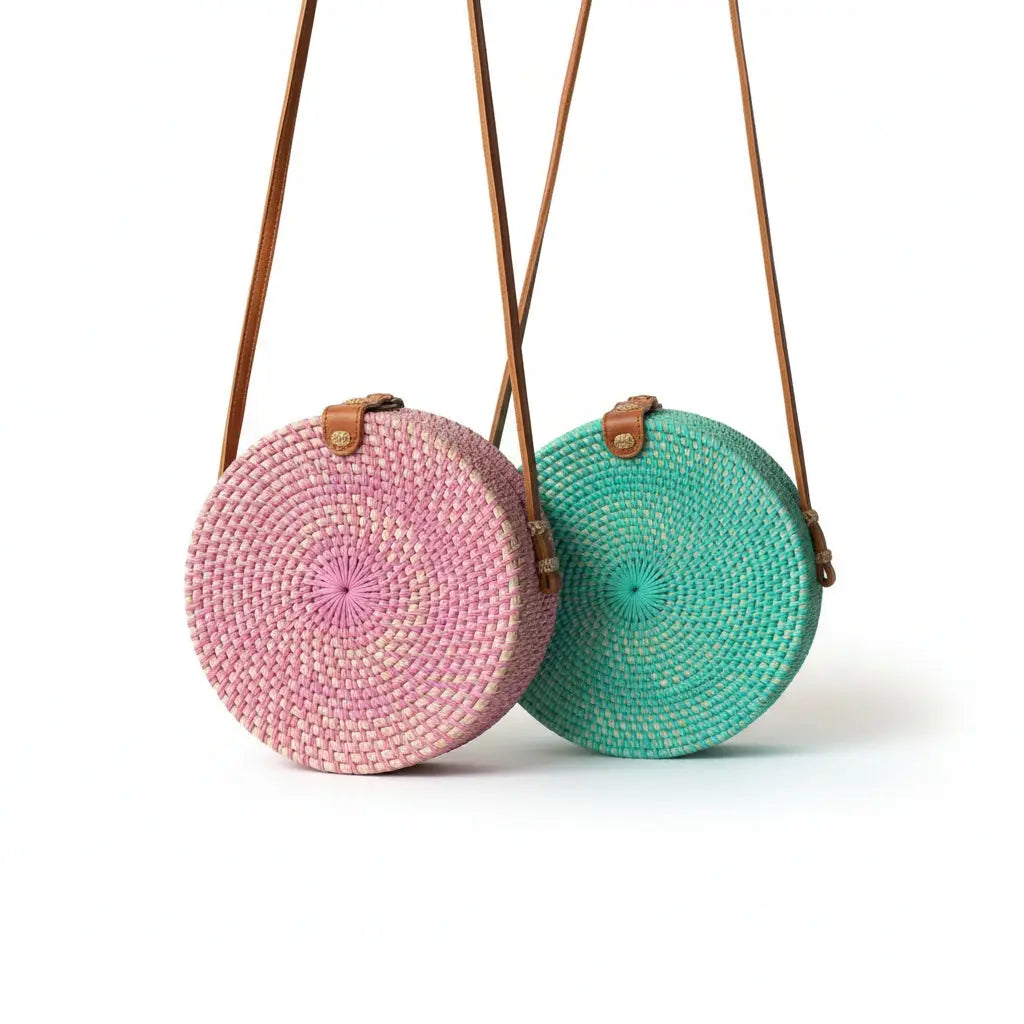 Pink round rattan purse with a woven texture, stylish and compact, ideal for casual or dressy occasions, by Suzie Blue Canada.