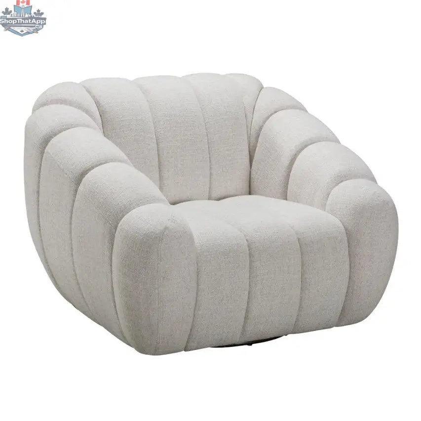 Modern Riro Swivel Accent Chair by Hygge Design House, angled view showing plush fabric upholstery and sleek armrest design.