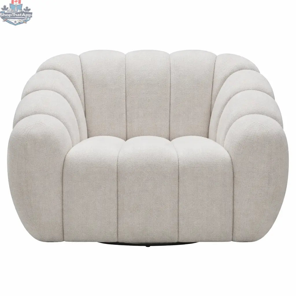 Cream Riro swivel accent chair by Hygge Design House with plush channeled upholstery and a modern, rounded design.