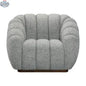 Grey textured boucle Riro swivel accent chair by Hygge Design House with modern, cozy design and swivel base.