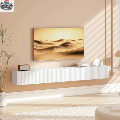 White Jesse floating TV stand with 2 fluted flip-down doors, designed for TVs up to 75 inches, from SLOTH Nation.