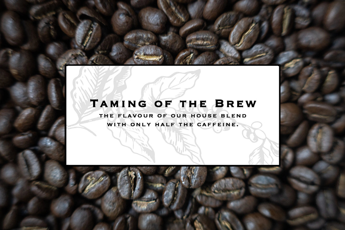 Half-caff coffee blend from Rose N Crantz Roasting Co, Taming of the Brew, with coffee beans and brewing setup.