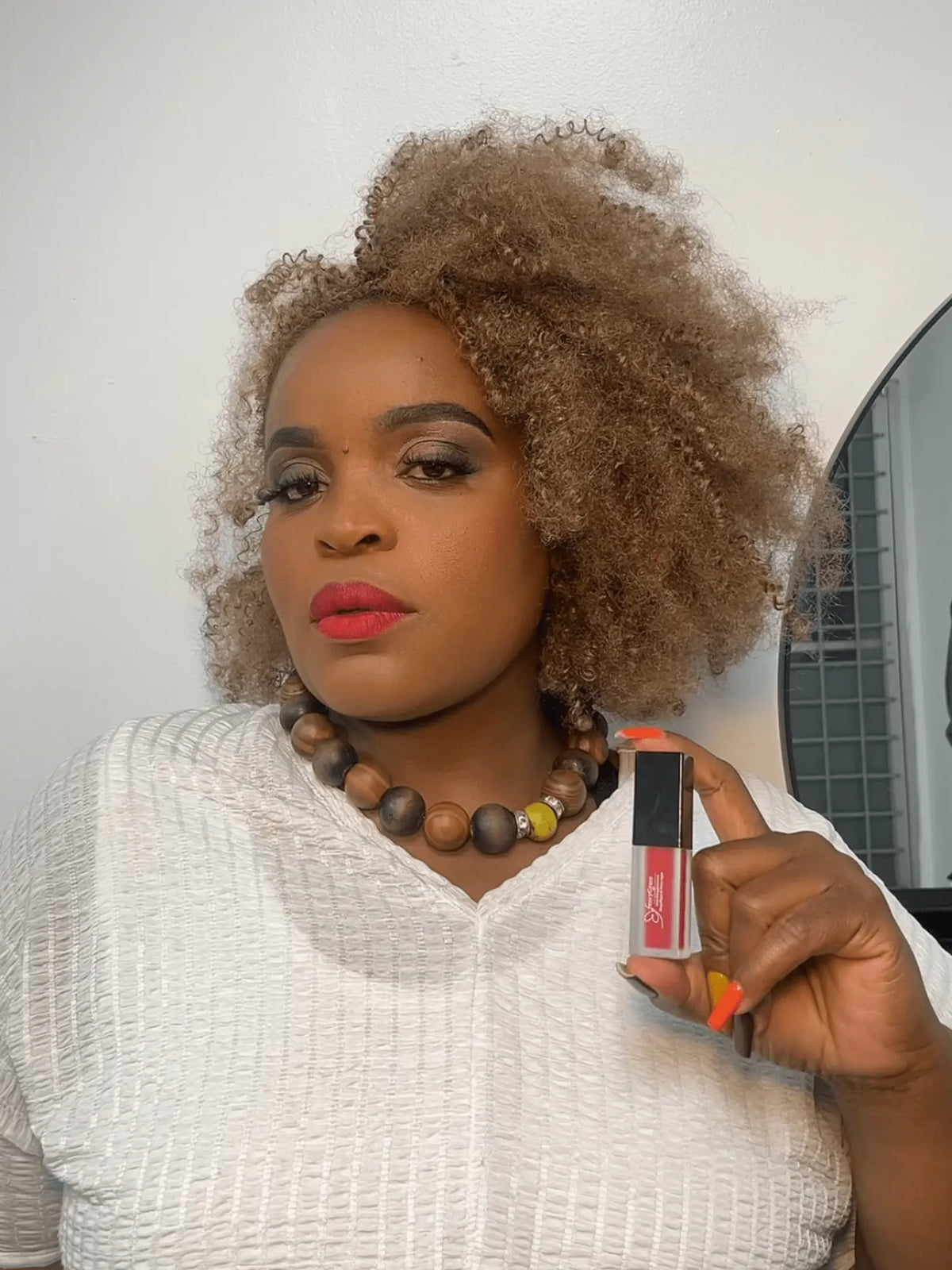 Fencygrace Vegan Matte Lipstick True Crimson 77 with rich red color and smooth matte finish, shown on lips.