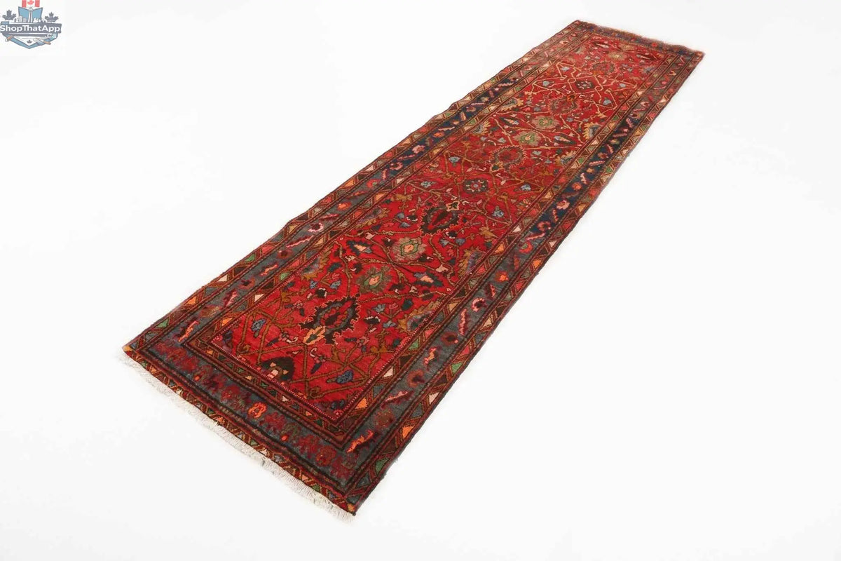 Persian Azerbaijan runner rug from Rug the Rock, 2' 7" x 10' 4", featuring intricate traditional geometric patterns in rich colors.