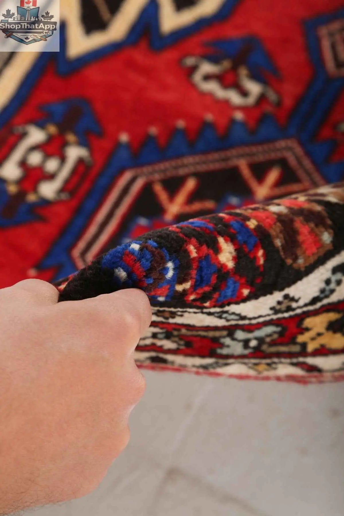 Persian Mazlaghan rug from Rug the Rock, 2' 7" x 4' 2", with intricate traditional patterns and rich colors on a woven surface.