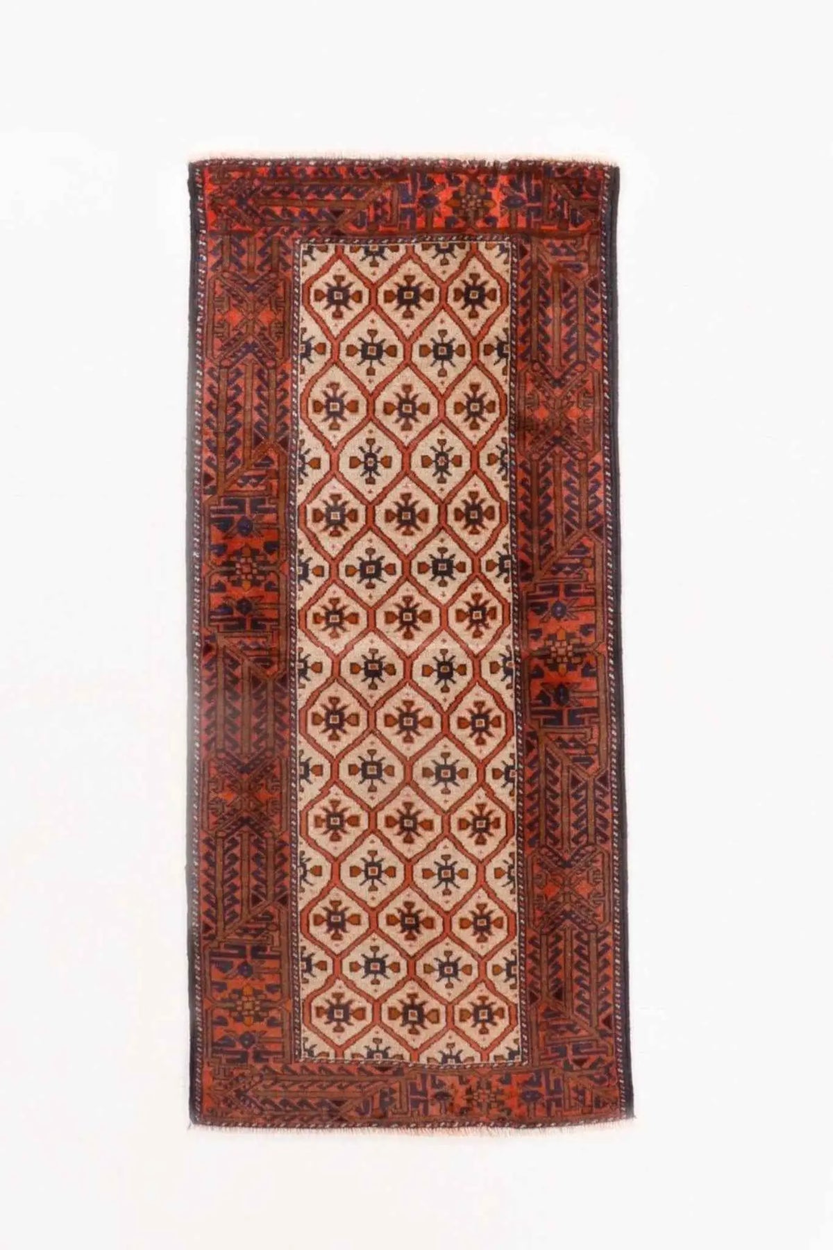 Persian Quchan Kurd rug with intricate geometric patterns in warm tones, measuring 2' 10" x 6' 9" from Rug the Rock.