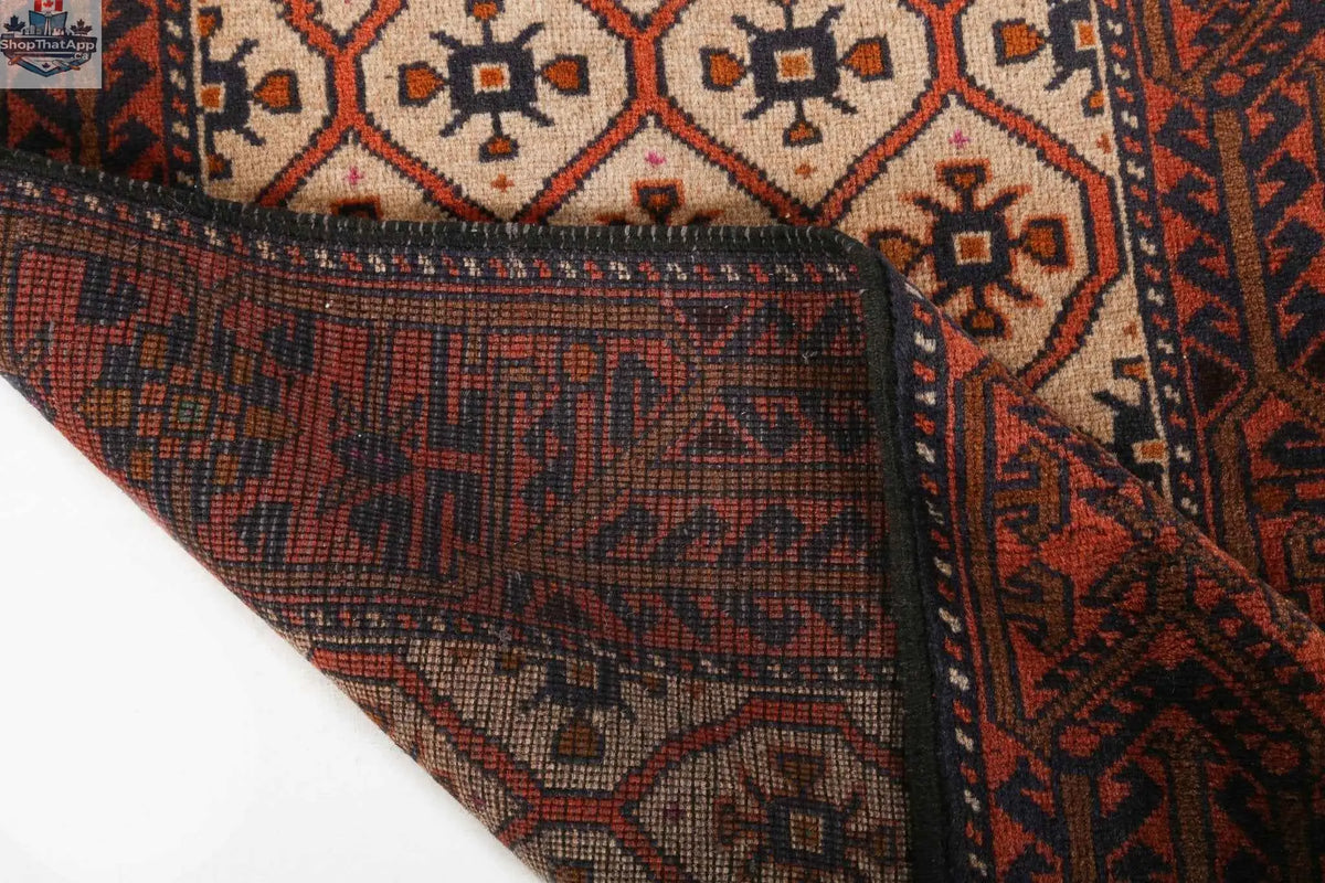Persian Quchan Kurd rug from Rug the Rock, 2' 10" x 6' 9", featuring traditional geometric patterns and vibrant colors.