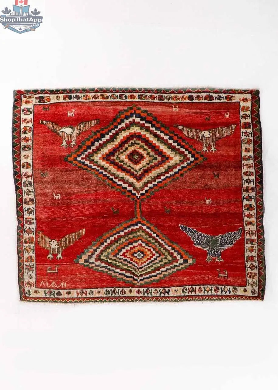 Persian Shiraz rug by Rug the Rock, 5'11" x 6'9", featuring intricate traditional patterns and vibrant colors on a woven fabric.