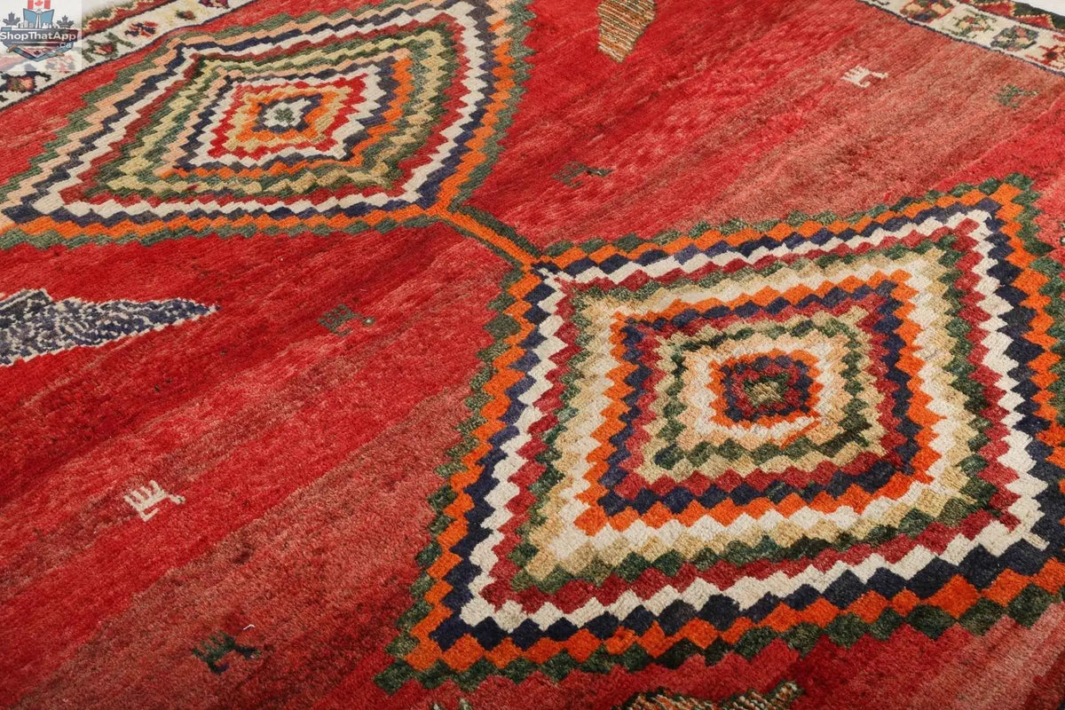 Persian Shiraz rug in 5'11" x 6'9" with intricate patterns, woven by Rug the Rock, showcasing traditional craftsmanship and vibrant colors.
