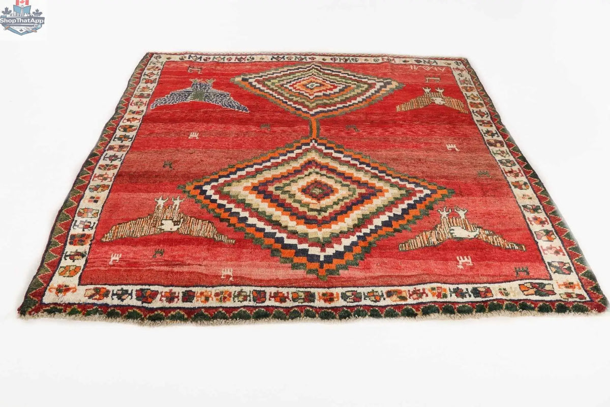 Persian Shiraz Rug by Rug the Rock, 5'11" x 6'9", featuring intricate traditional patterns in rich colors.