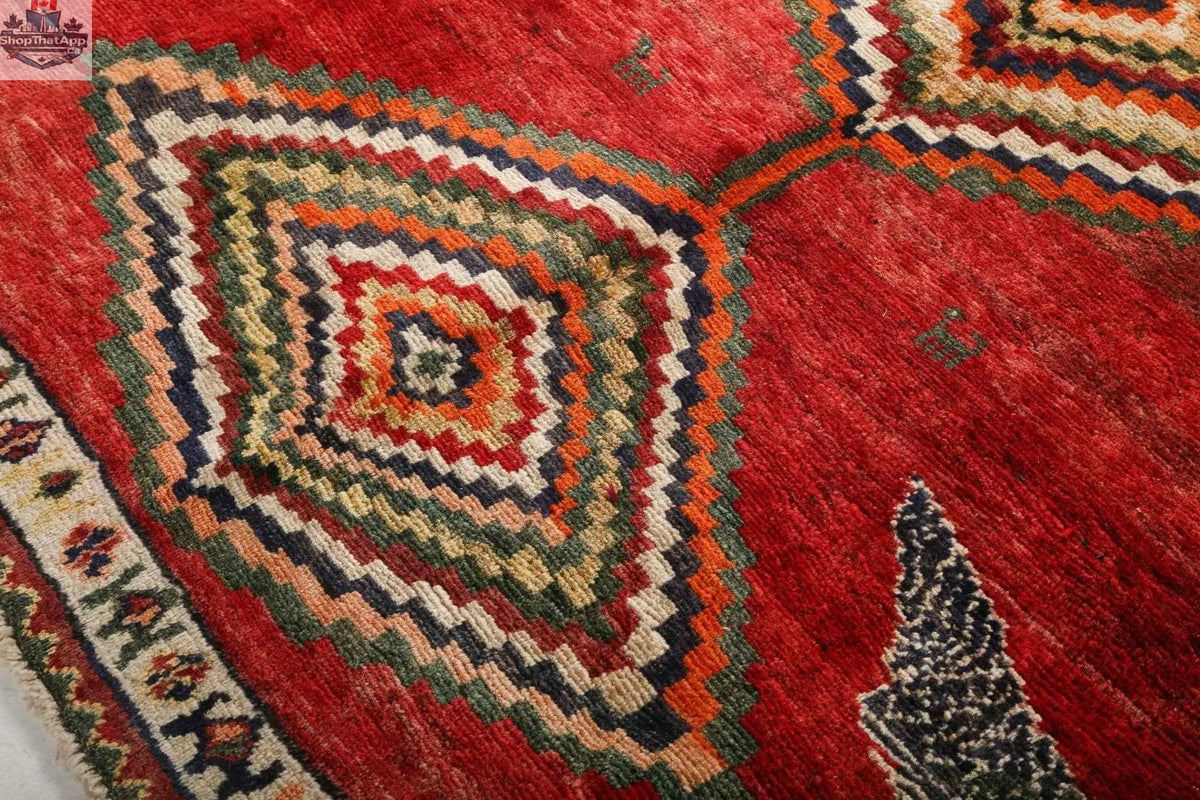 Persian Shiraz rug from Rug the Rock, 5' 11" x 6' 9", featuring intricate traditional patterns and rich colors.