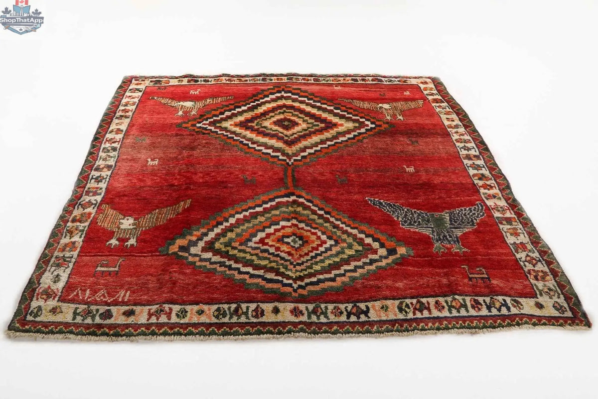 Persian Shiraz rug measuring 5'11" x 6'9" featuring intricate traditional patterns and rich colors, from Rug the Rock.