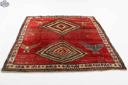 Persian Shiraz rug measuring 5'11" x 6'9" featuring intricate traditional patterns and rich colors, from Rug the Rock.