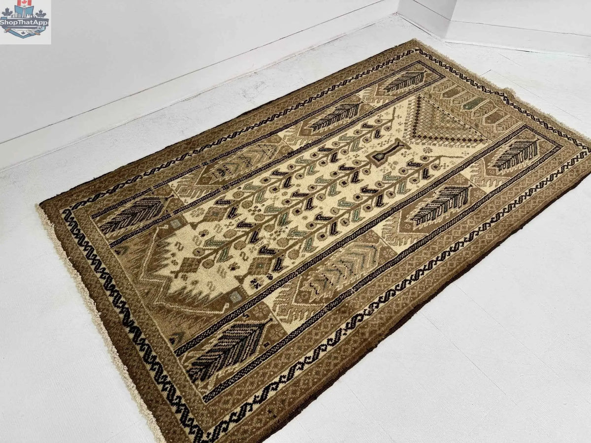 Persian Baluch Rug by Rug the Rock, 3' 5" x 6' 1" with intricate traditional patterns and rich colors.