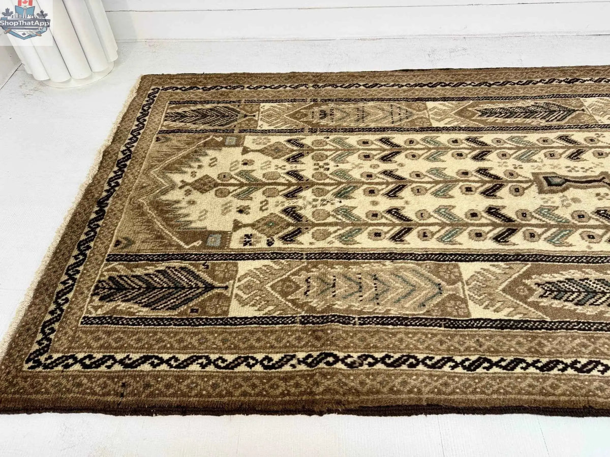 Persian Baluch Rug by Rug the Rock, 3' 5” x 6' 1”, with intricate traditional patterns and rich colors.