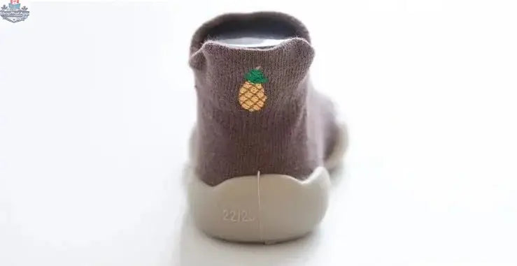 Wild Baby sock shoes featuring soft fabric and colorful patterns, designed for comfortable and stylish baby footwear.