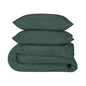 Luxurious forest green sateen duvet cover set by Skylark+Owl Canada featuring smooth, refined bedding for ultimate comfort.