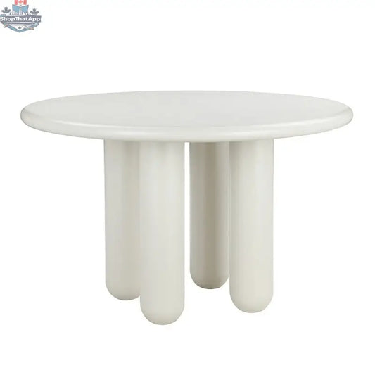 Hygge Design House Nubi Round Dining Table with wooden top and sleek legs, ideal for modern dining spaces