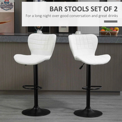 Set of two white Avion adjustable height barstools by SLOTH Nation with swivel seats, modern design for kitchen or bar area.