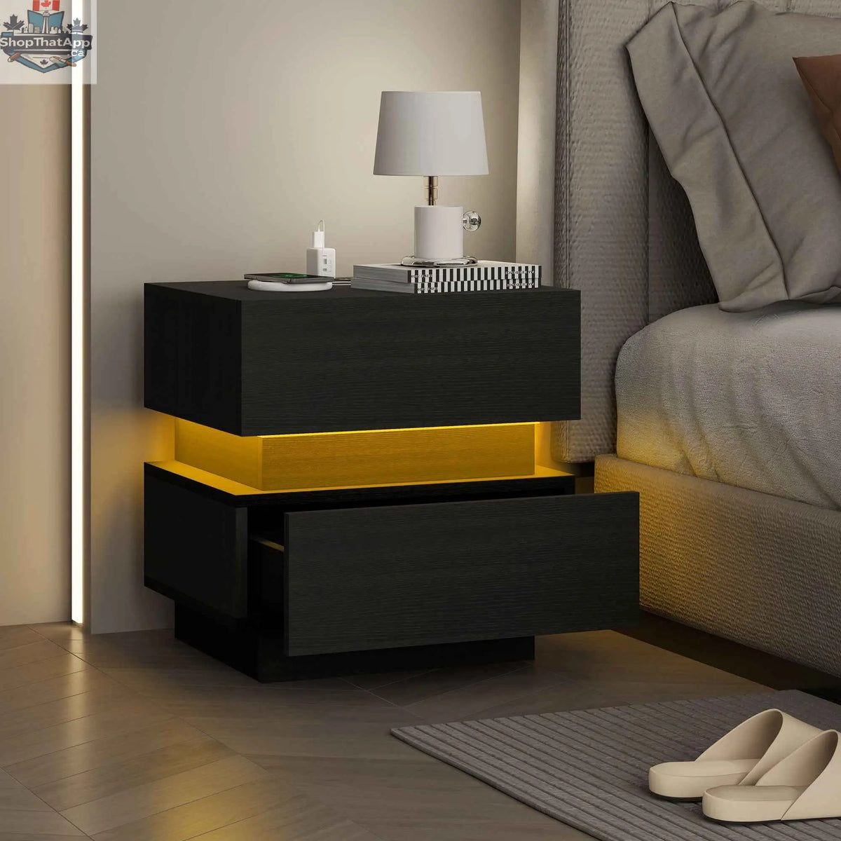 Black Emma bedside table by SLOTH Nation with USB ports, charging station, and LED light for bedroom storage and convenience.