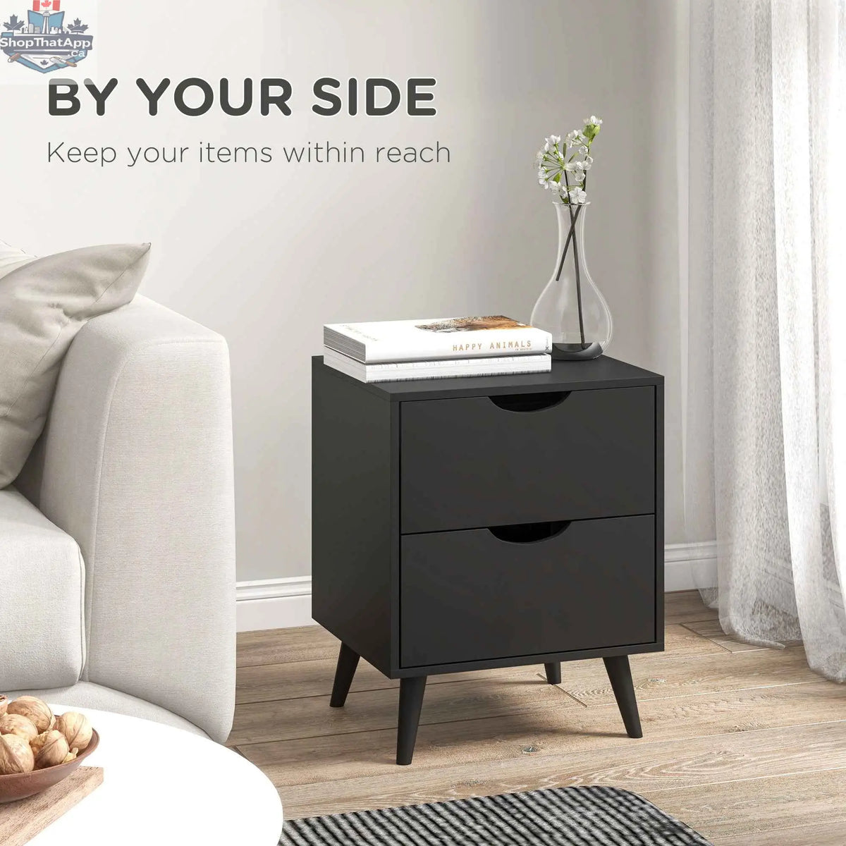 Black Jesse nightstand with drawers and pine wood legs from SLOTH Nation, stylish bedroom furniture for convenient storage.