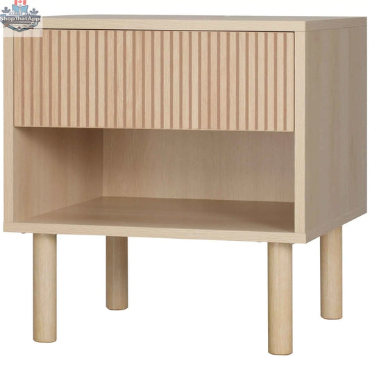 Laura modern bedside table by SLOTH Nation with a drawer and open shelf in natural wood finish, ideal for bedroom decor.
