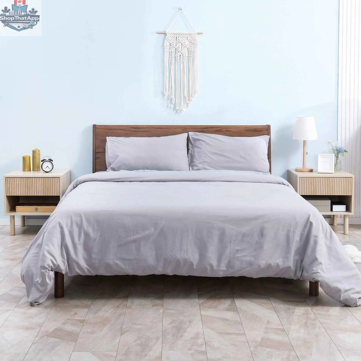 Pair of modern natural wood nightstands with drawers and open shelves from SLOTH Nation bedroom furniture set.
