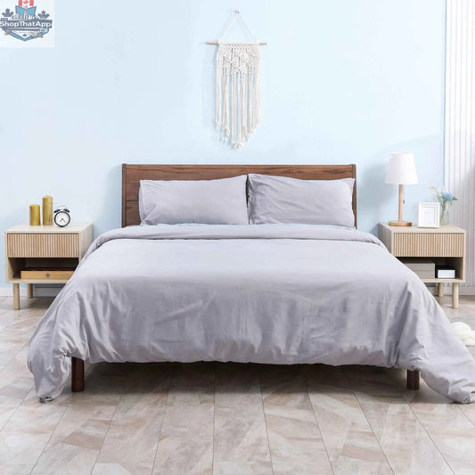 Pair of modern natural wood nightstands with drawers and open shelves from SLOTH Nation bedroom furniture set.