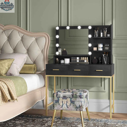 Sophia illuminated makeup table by SLOTH Nation with LED lights, black finish, and three drawers for bedroom storage.