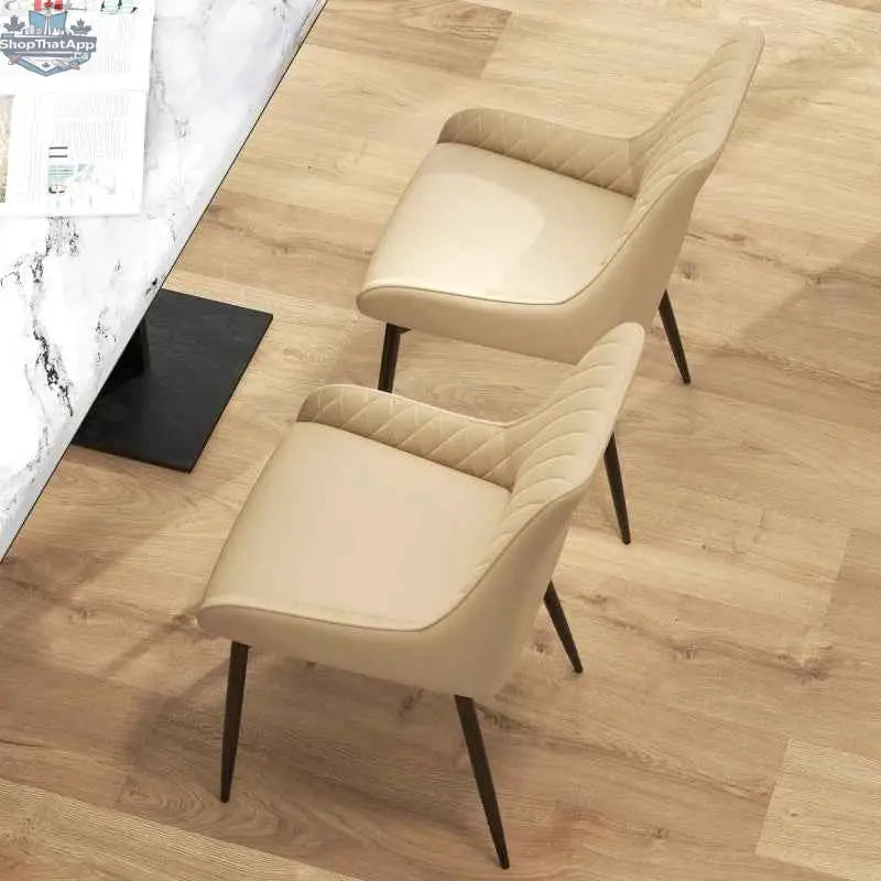 Set of two Blake modern dining chairs in khaki with sleek design and wooden legs from SLOTH Nation.