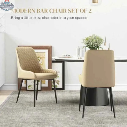Pair of Blake modern dining chairs by SLOTH Nation in khaki fabric, featuring sleek design and cushioned seats for stylish comfort.