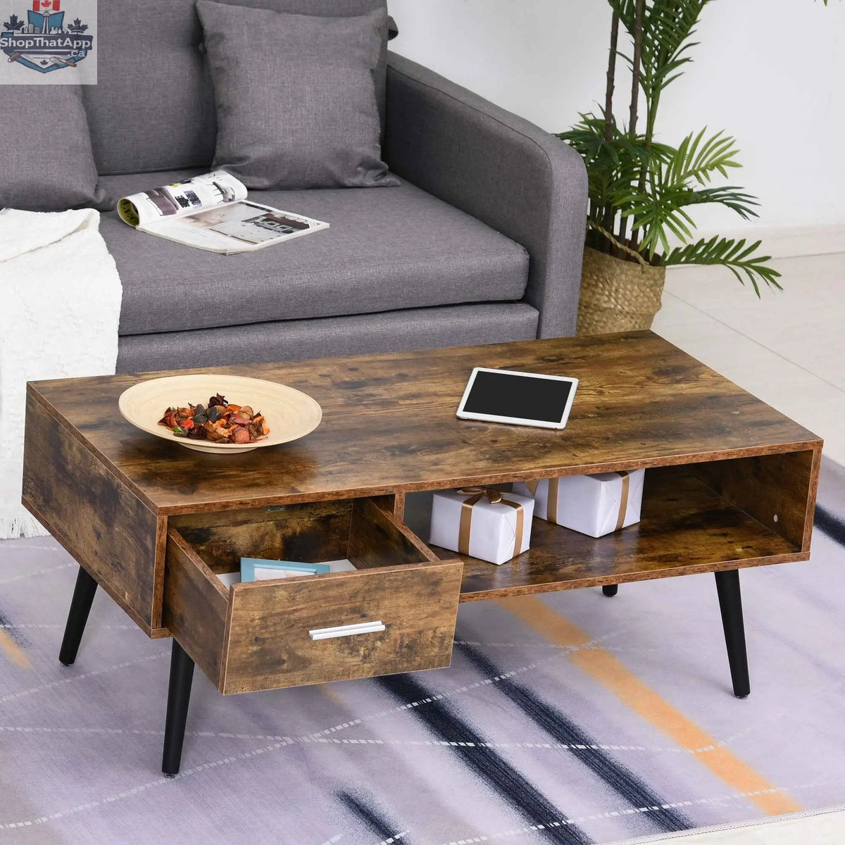 Rustic brown Omari retro coffee table by SLOTH Nation with storage shelf and drawer, featuring a sturdy wooden design.