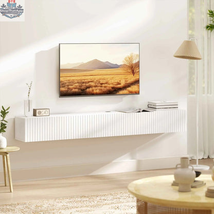 White Jesse floating TV stand with two fluted flip-down doors, designed for TVs up to 75 inches, by SLOTH Nation.