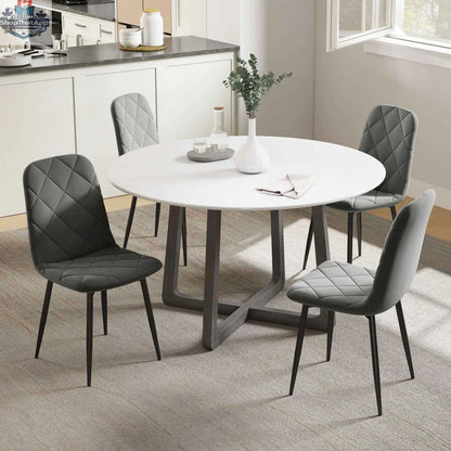 Set of four grey Arbor upholstered dining chairs with steel legs by SLOTH Nation, featuring padded seats and modern design.