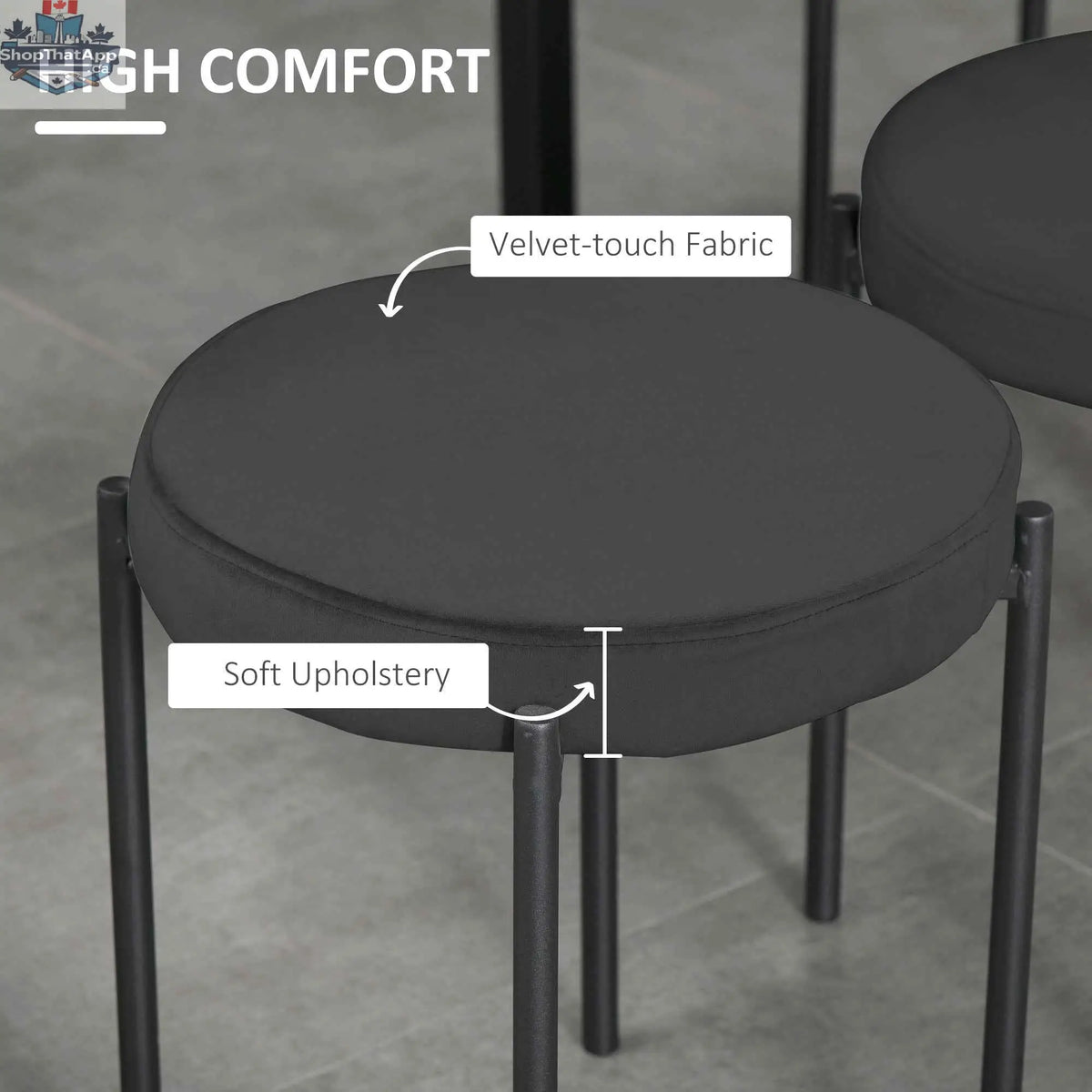Set of four black Noel backless round dining stools with metal legs by SLOTH Nation, perfect for modern kitchen or dining area.
